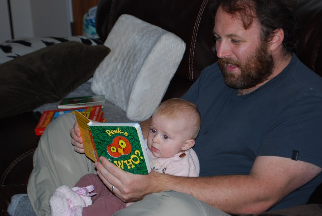 daddy reads to ellie